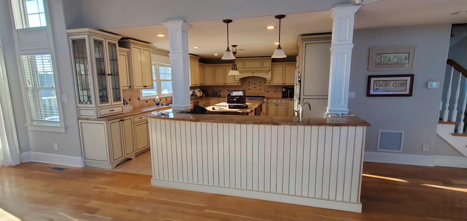 Coastal white shaker kitchen with blue backsplash, Avalon NJ project