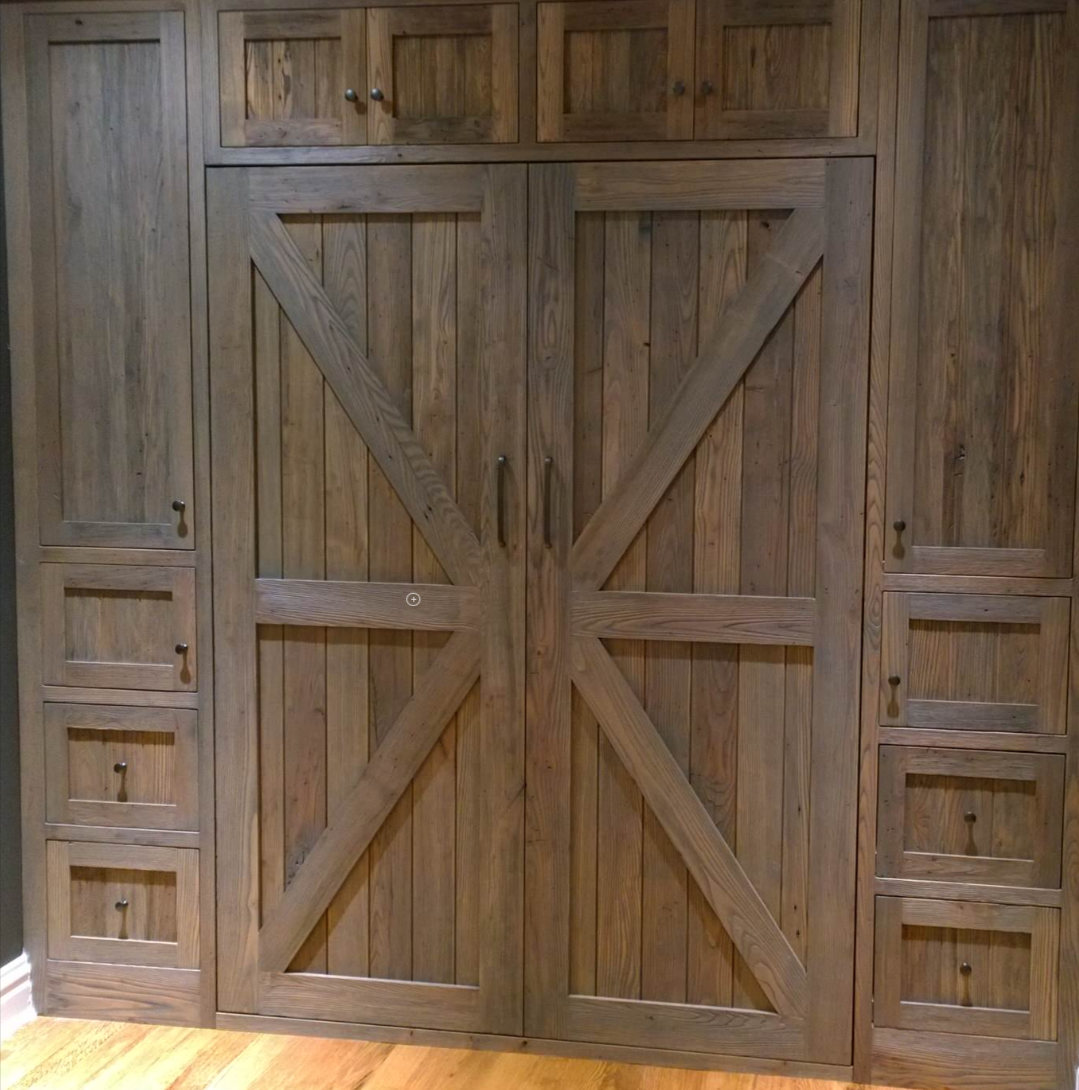 Murphy bed cabinetry detail with rustic finish