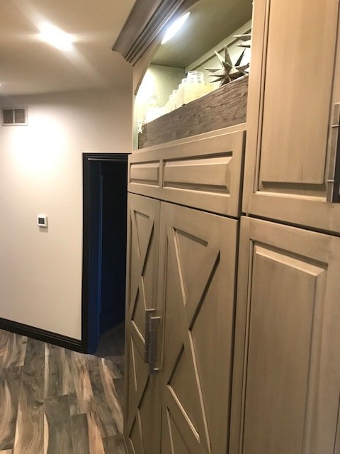 Custom kitchen detail with open shelving and solid wood construction