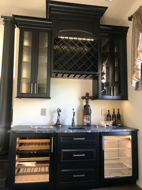 Rustic kitchen cabinets with custom range hood, Amish craftsmanship