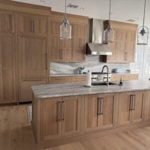Custom rift-cut white oak kitchen cabinets with granite countertops and shaker doors, Pennsylvania