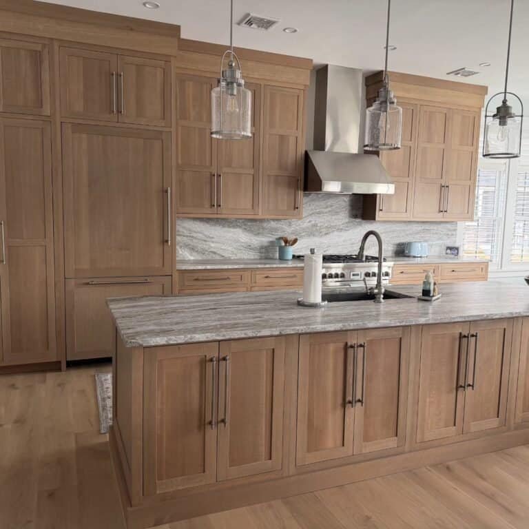Custom rift-cut white oak kitchen cabinets with granite countertops and shaker doors, Pennsylvania